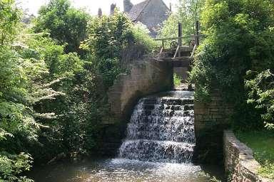 Picture of water running down an old mill stream