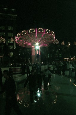 Attractions from the fairground reflect on the ice Attractions from the fairground reflect on the ice