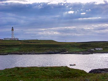 The lighthouse on Orsay from Port Wemyss Picture of the lighthouse on Orsay