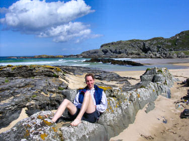 Picture of Imke sitting on some rocks