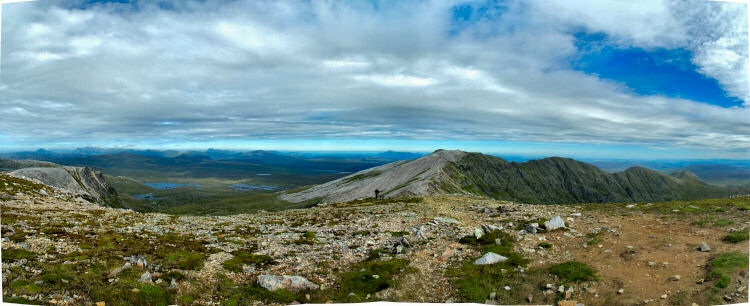 2.5MB downloads for this panorama Picture of a panoramic view over a ridge and wide landscape