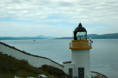Picture of a lighthouse with a sound behind it