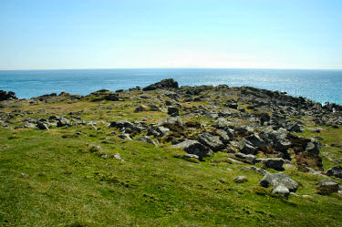 Picture of a rocky piece of land stretching out into the sea