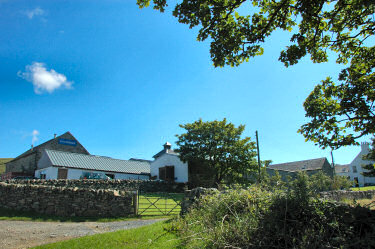 Picture of the outside of a farm distillery