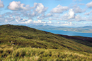 Picture of the summit of a hill with a sea loch below